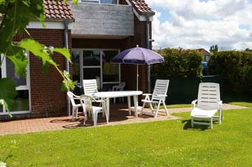 umzäunter Garten der Ferienwohnung Seeperle Nessmersiel